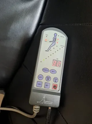 Sillón masajeador con reposapiés