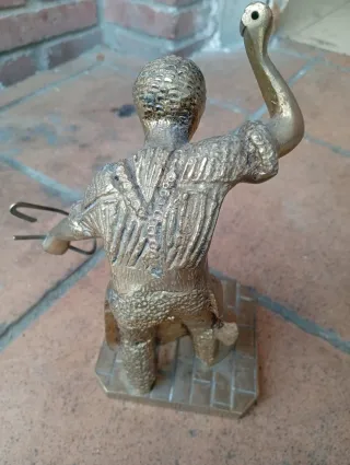 Figura de bronce guerrero
