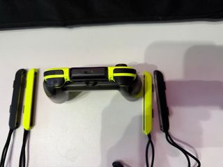 Joy-Con Amarillo Nintendo Switch + cargador.