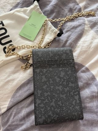 Bolso Tous gris con cadena dorada