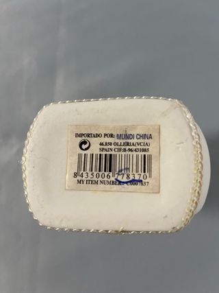 Jarrón decorativo blanco y dorado