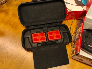 Nintendo Switch + Custodia e Cuffie