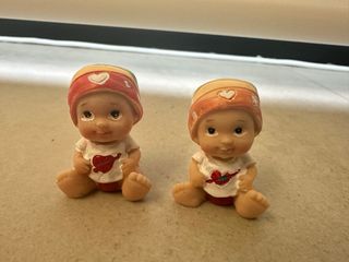 2 Figuras Bebé Pelón Posibilidad de cambio
