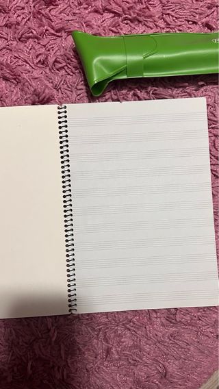 Flauta dulce y libreta de música
