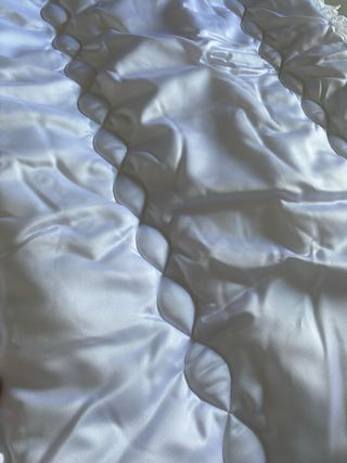 Piumone e paracolpi culla bianco