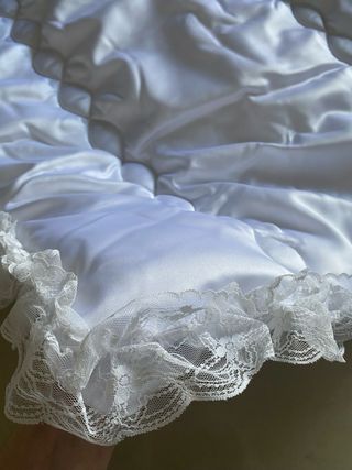 Piumone e paracolpi culla bianco