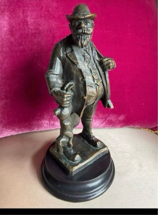 Figura bronce cazador con presa