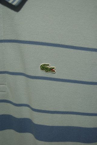 Polo Lacoste a righe azzurra - Taglia M