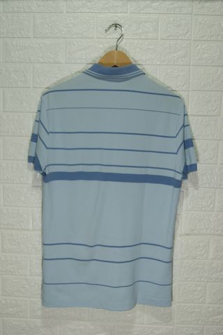Polo Lacoste a righe azzurra - Taglia M