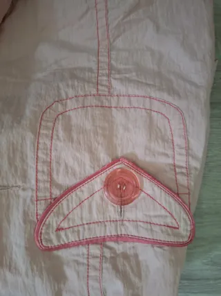 Bata rosa con protección solar