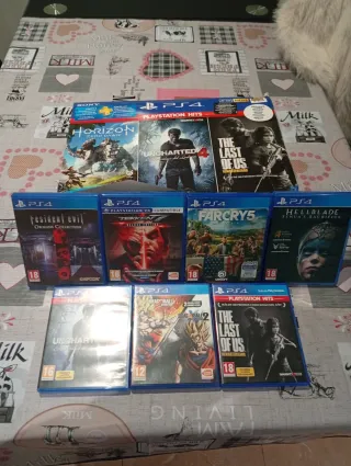 PS4 (PlayStation 4) Negra + 2 Mandos y 7 Juegos