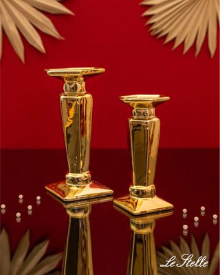 Portacandele dorati in metallo