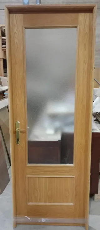 Puerta de roble vidriera