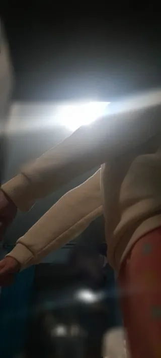 Sudadera beige con estampado