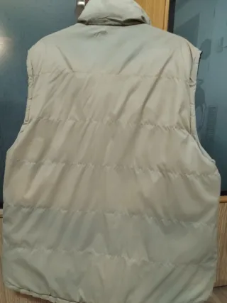 Chaleco reversible azul y beige