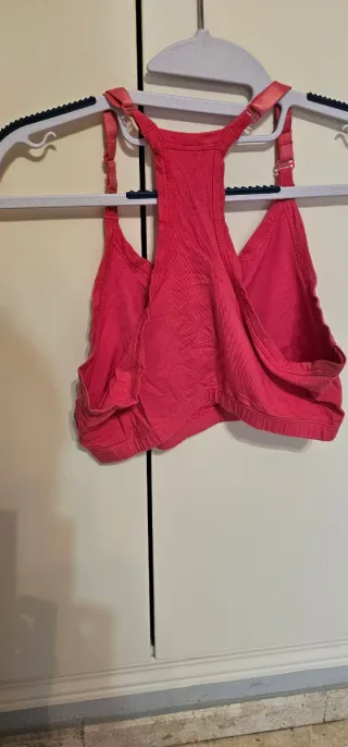 Sujetador deportivo Domys verde y rosa.