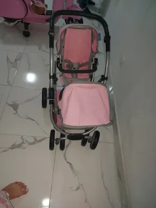 Carrito de muñecas doble rosa