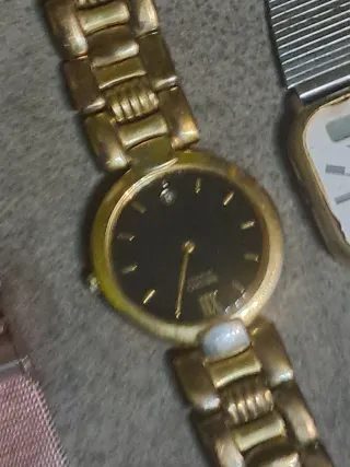 Lote de relojes dorados y plateados