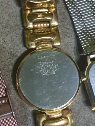 Lote de relojes dorados y plateados