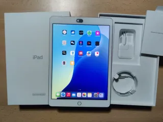 iPad 7 oro rosa y adaptador lightning