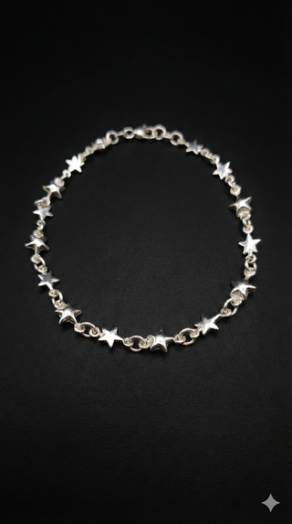 Pulsera de plata con eslabones de estrellas