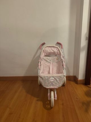 Carrito de muñecas rosa
