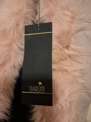 Chaleco de piel y pelo rosa y beige