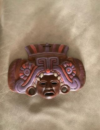 Maschera da parete in ceramica