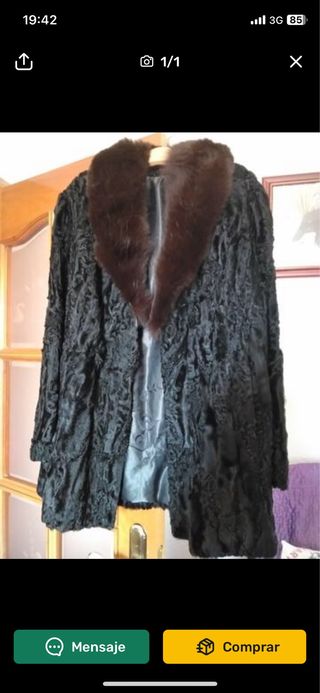Chaquetón negro con cuello de pelo