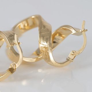 Pendientes de aro en oro 18k 750 forma de 8