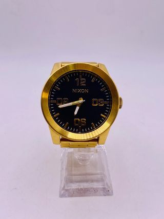 RELOJ NIXON THE CORPORAL DORADO