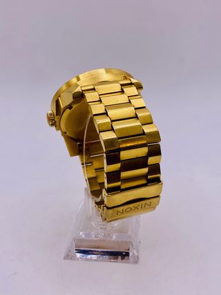 RELOJ NIXON THE CORPORAL DORADO