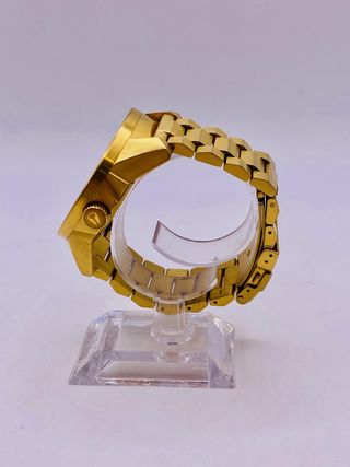 RELOJ NIXON THE CORPORAL DORADO