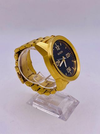 RELOJ NIXON THE CORPORAL DORADO
