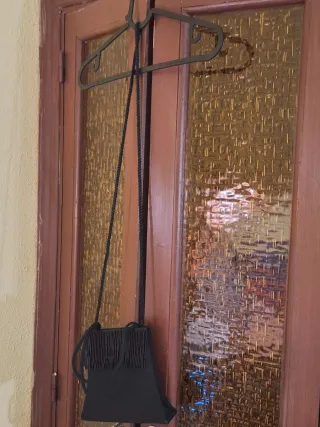 Bolso vintage negro con flecos