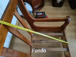 Sillón clásico de cuero y madera