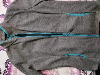 Sudadera Crivit cremallera gris turquesa