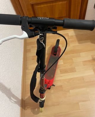 Patinete Oxelo Mid9 Rojo Usado 2 veces