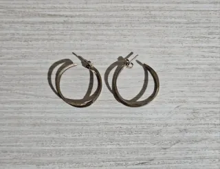 Pendientes aro dorados entrelazados