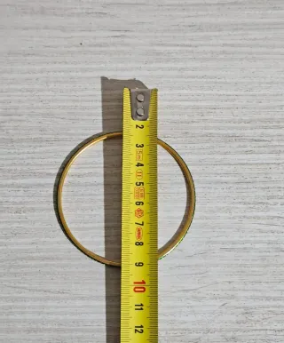 Pulseras verdes con puntos dorados