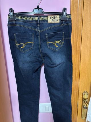Pantalones Desigual azules con detalles dorados