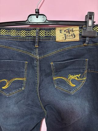 Pantalones Desigual azules con detalles dorados