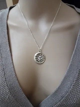 Collana in acciaio con sole e luna