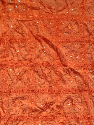 Camisa naranja manga larga con lentejuelas