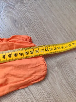 Camisa naranja manga larga con lentejuelas