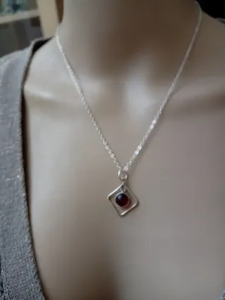 Collana argento e acciaio con granato