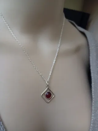 Collana argento e acciaio con granato