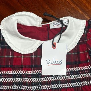 Vestitino a quadri rosso per bambina