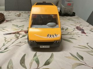 Autobús escolar amarillo de juguete