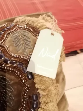 Bolso verde con adornos